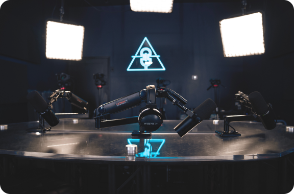 image of microphones and other podcasting equipment inside of the transcend podcast studio