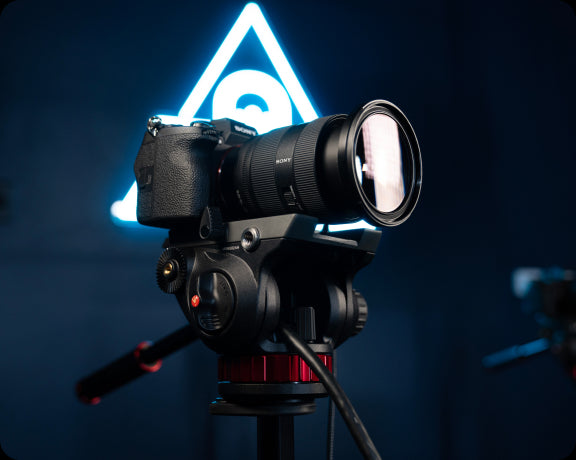 image of a camera and transcend podcast studio logo glowing behind it